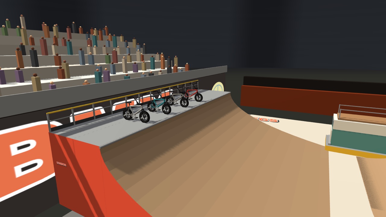 The fenced launch deck with three spare bikes parked, the launch ramp falling away below and a crowd in the stands above.